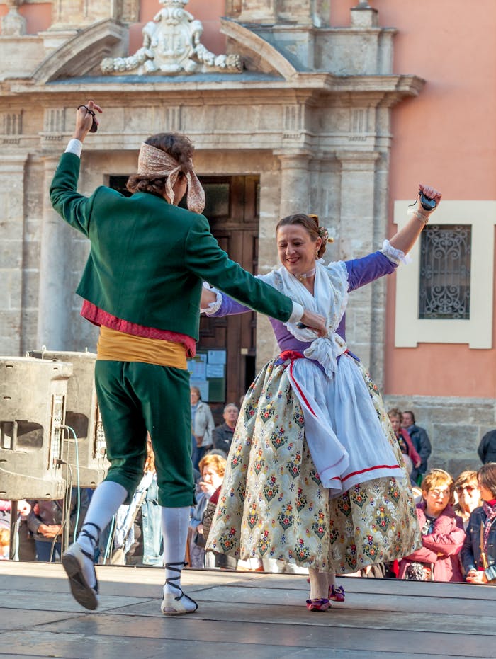 Colorful traditional dance performance in Valencia, featuring dancers in authentic costumes.