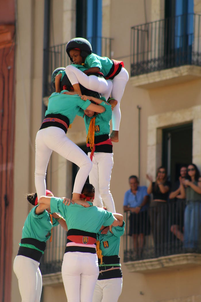 A vibrant human tower performance in Tarragona, Spain, showcasing traditional Catalan culture.